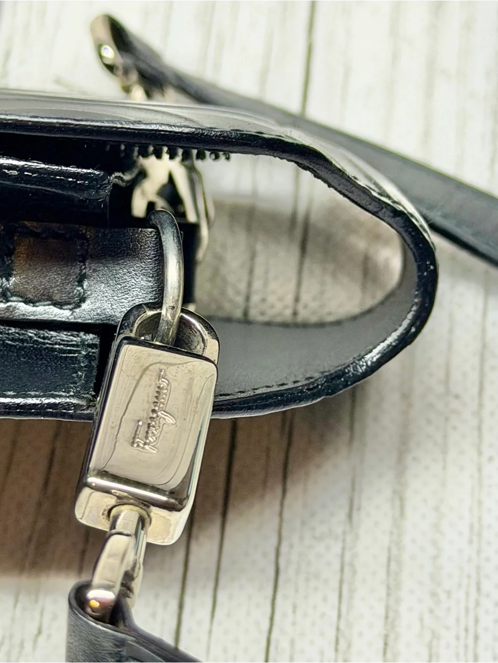 PRE LOVED Salvatore Ferragamo Gancini-embossed mini pouch